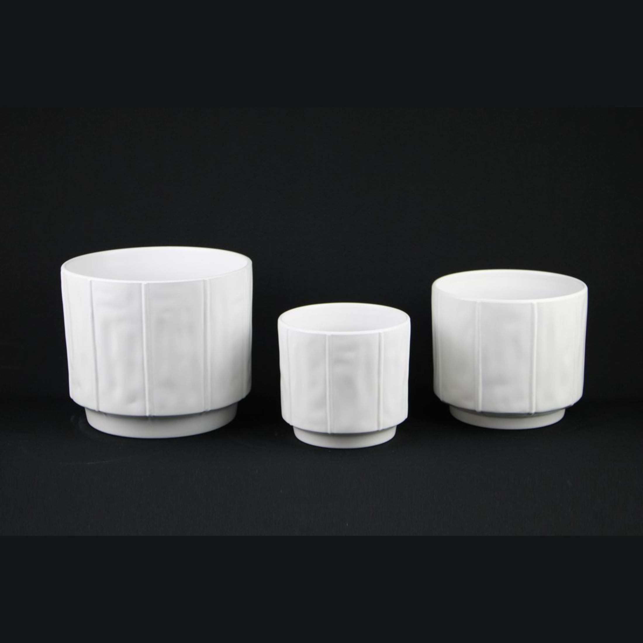3-Piece White Stoneware Planter Pot Set with Soft Vertical Texture